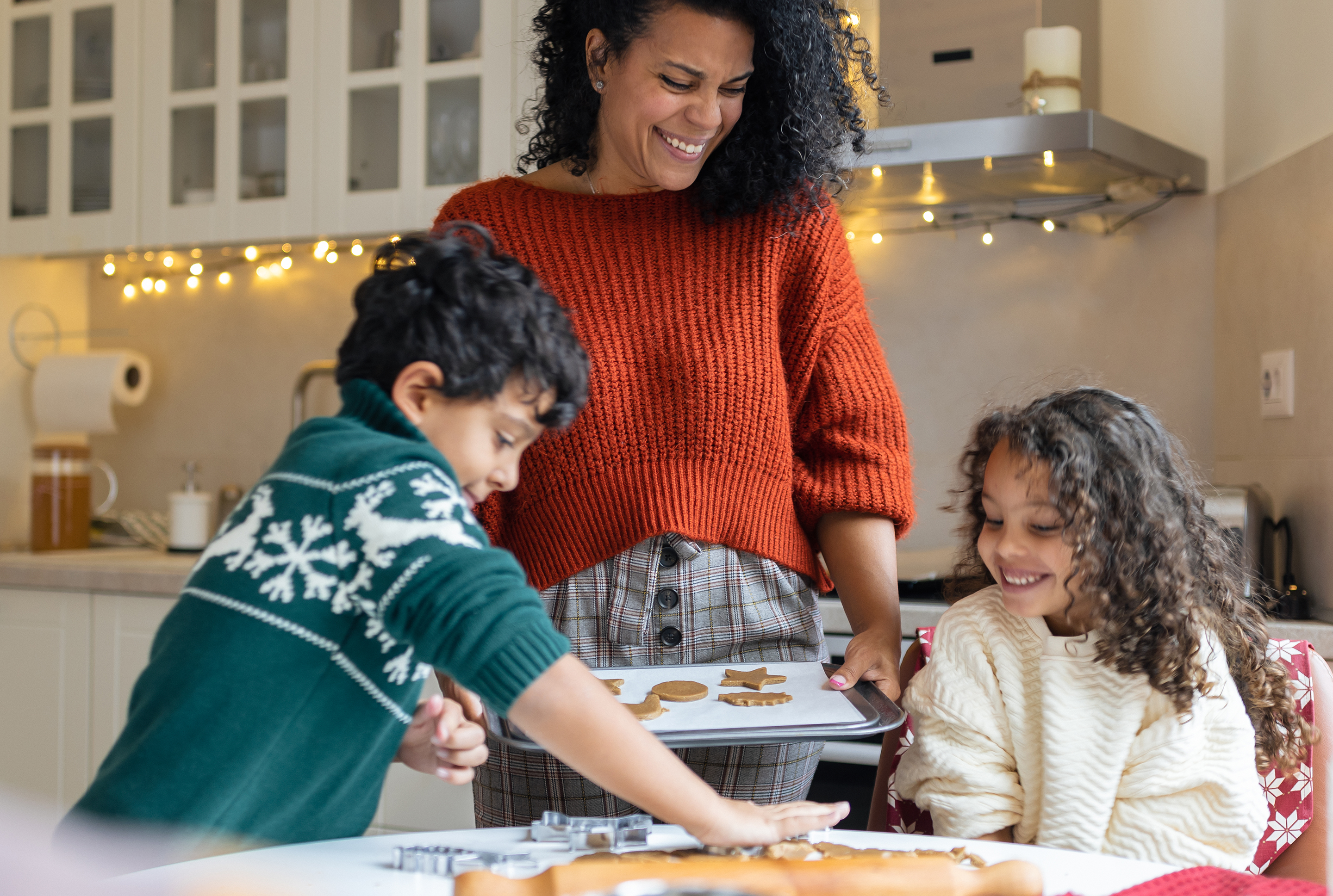 family baking holiday cookies