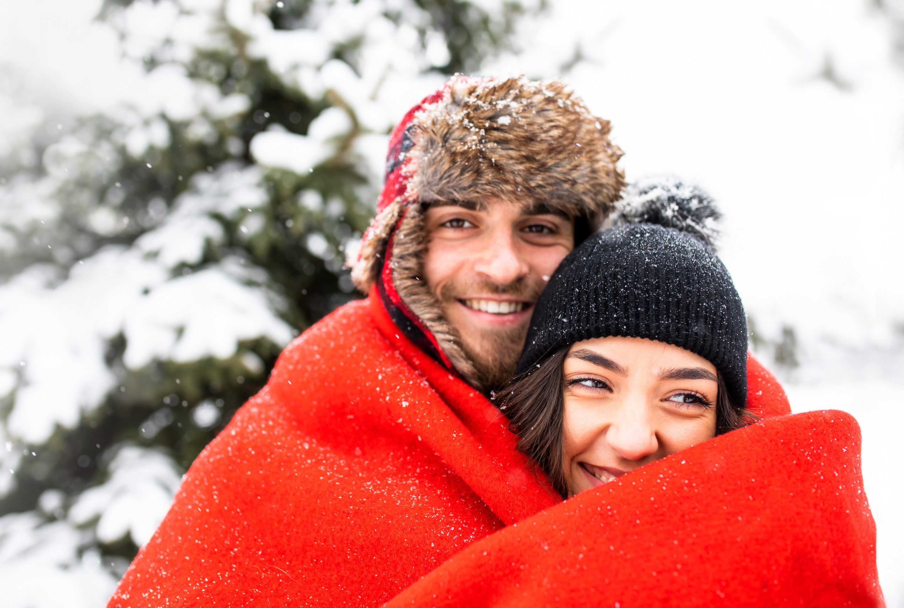 couple outside in the snow